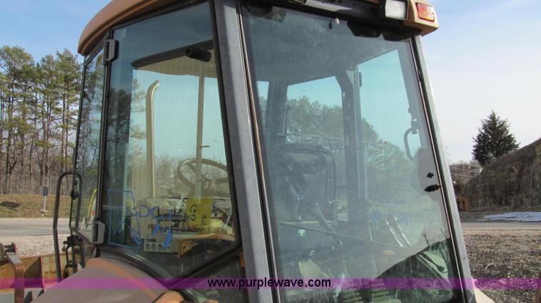 image for item E3641 1999 New Holland 675E backhoe