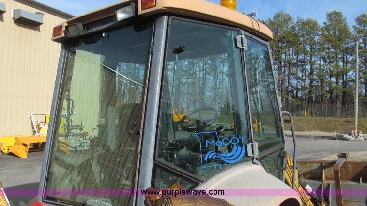 image for item E3641 1999 New Holland 675E backhoe