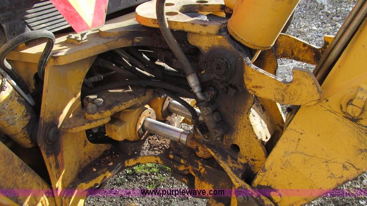 image for item E3641 1999 New Holland 675E backhoe