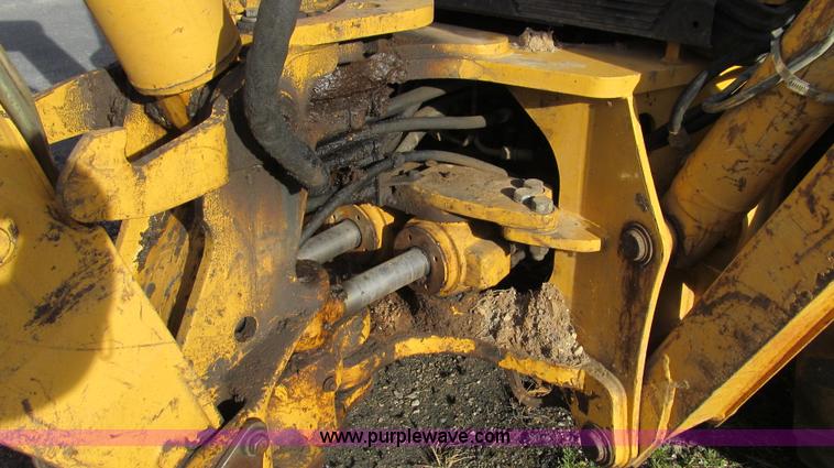 image for item E3641 1999 New Holland 675E backhoe