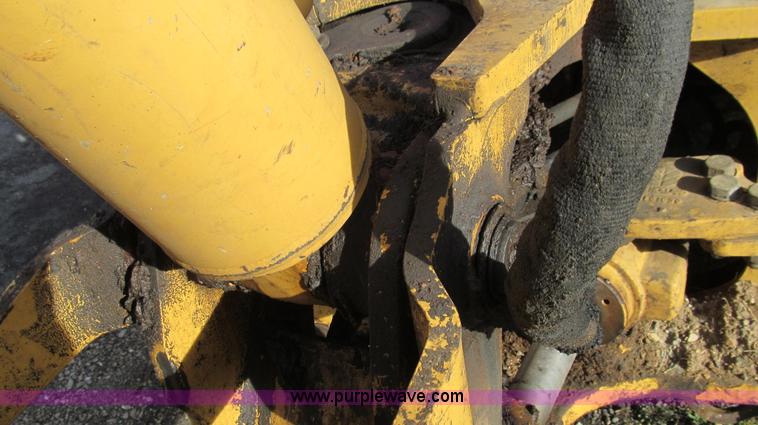 image for item E3641 1999 New Holland 675E backhoe