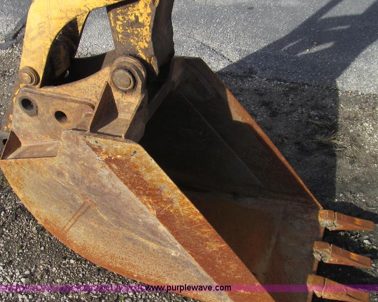image for item E3641 1999 New Holland 675E backhoe