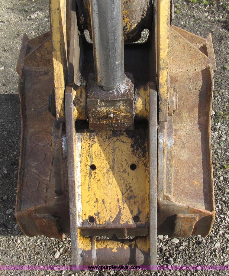 image for item E3641 1999 New Holland 675E backhoe