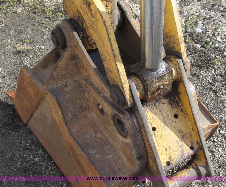 image for item E3641 1999 New Holland 675E backhoe