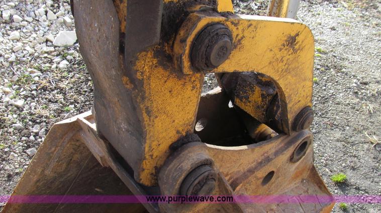 image for item E3641 1999 New Holland 675E backhoe