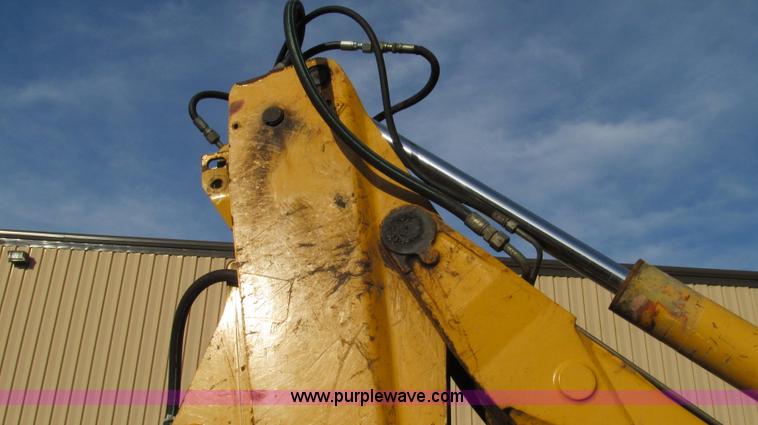 image for item E3641 1999 New Holland 675E backhoe