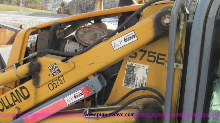 image for item E3641 1999 New Holland 675E backhoe