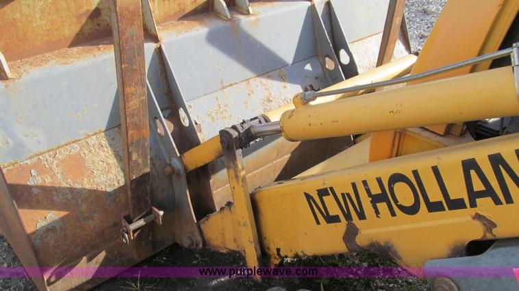 image for item E3641 1999 New Holland 675E backhoe