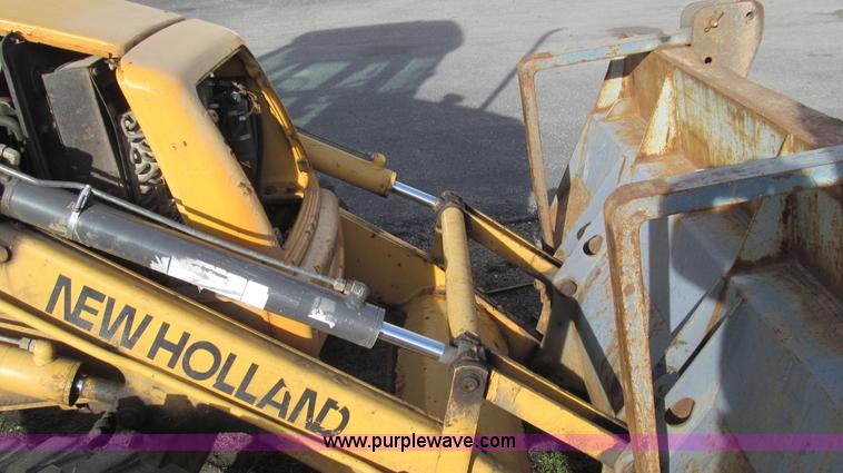 image for item E3641 1999 New Holland 675E backhoe