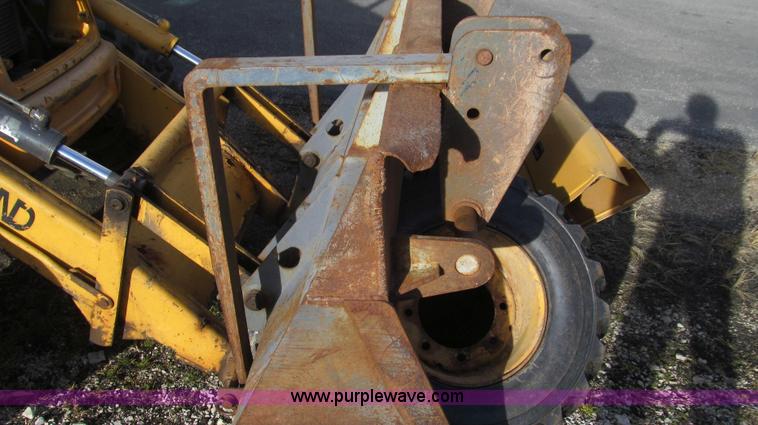 image for item E3641 1999 New Holland 675E backhoe