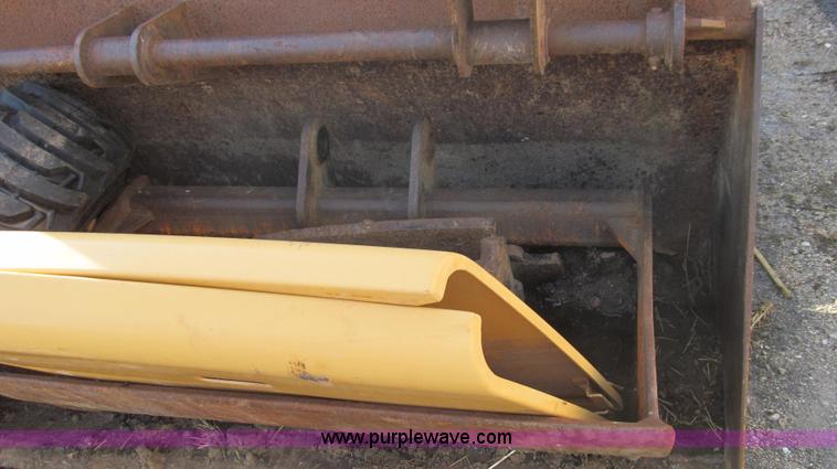 image for item E3641 1999 New Holland 675E backhoe