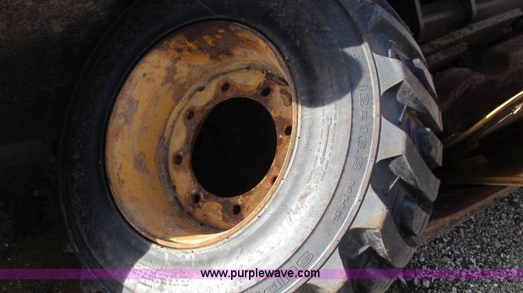 image for item E3641 1999 New Holland 675E backhoe