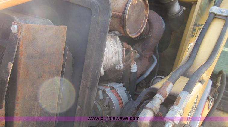 image for item E3641 1999 New Holland 675E backhoe