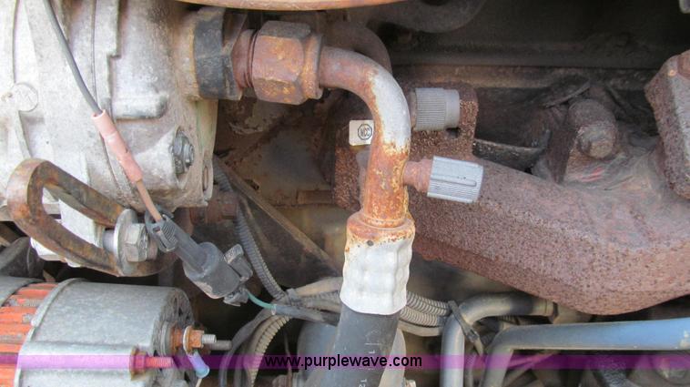 image for item E3641 1999 New Holland 675E backhoe