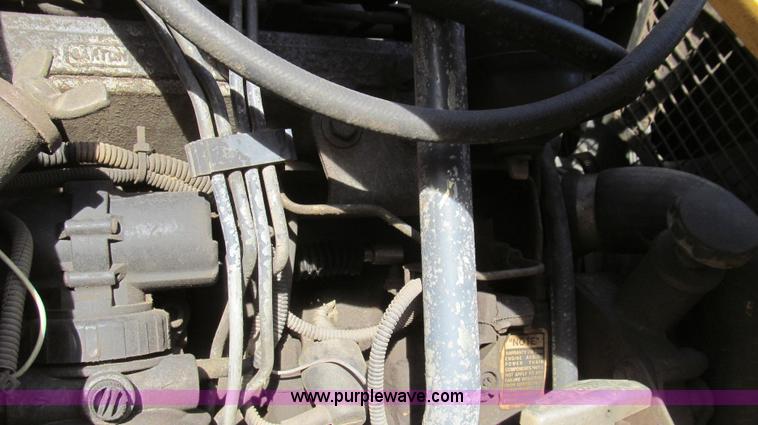 image for item E3641 1999 New Holland 675E backhoe