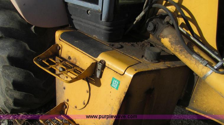 image for item E3641 1999 New Holland 675E backhoe