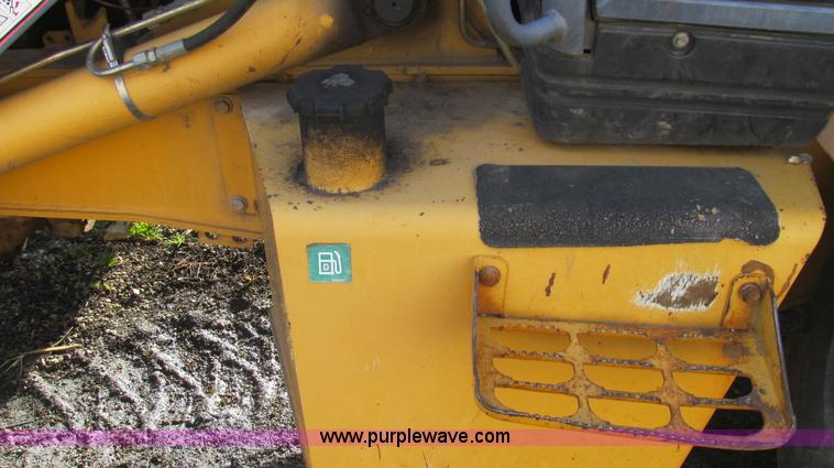 image for item E3641 1999 New Holland 675E backhoe