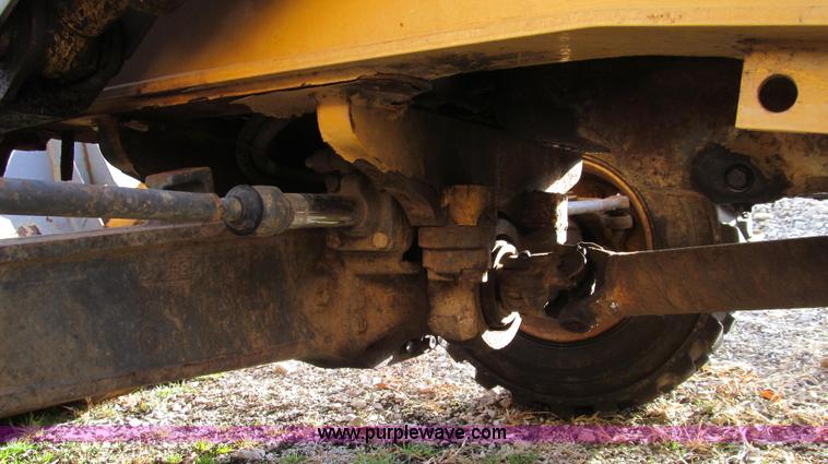 image for item E3641 1999 New Holland 675E backhoe