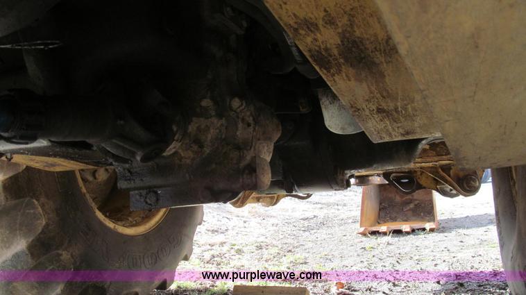 image for item E3641 1999 New Holland 675E backhoe