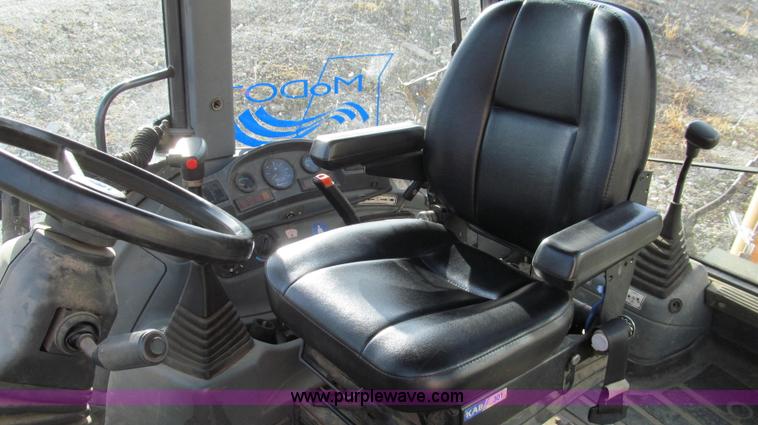 image for item E3641 1999 New Holland 675E backhoe