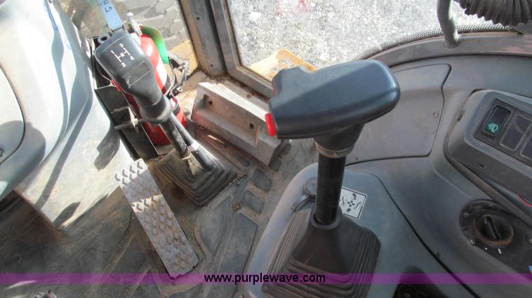 image for item E3641 1999 New Holland 675E backhoe