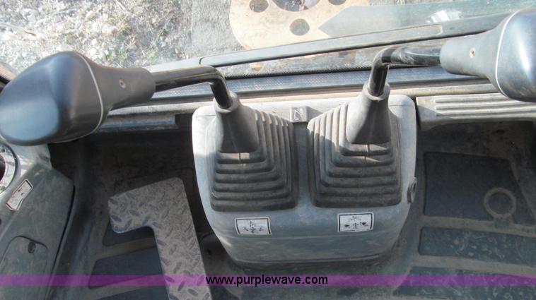image for item E3641 1999 New Holland 675E backhoe