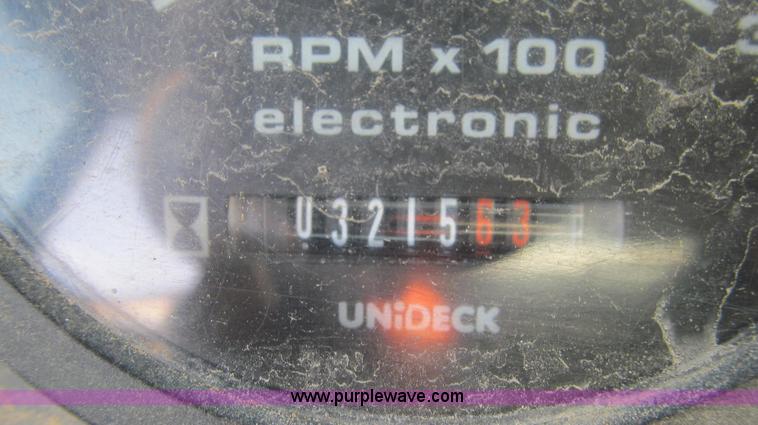 image for item E3641 1999 New Holland 675E backhoe