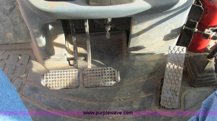 image for item E3641 1999 New Holland 675E backhoe