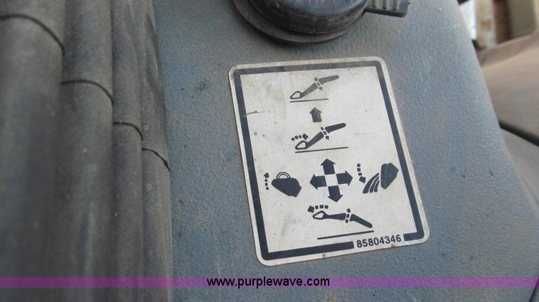 image for item E3641 1999 New Holland 675E backhoe