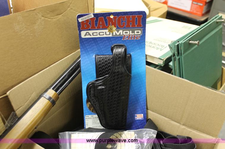 image for item E8331 Assorted firearm accessories