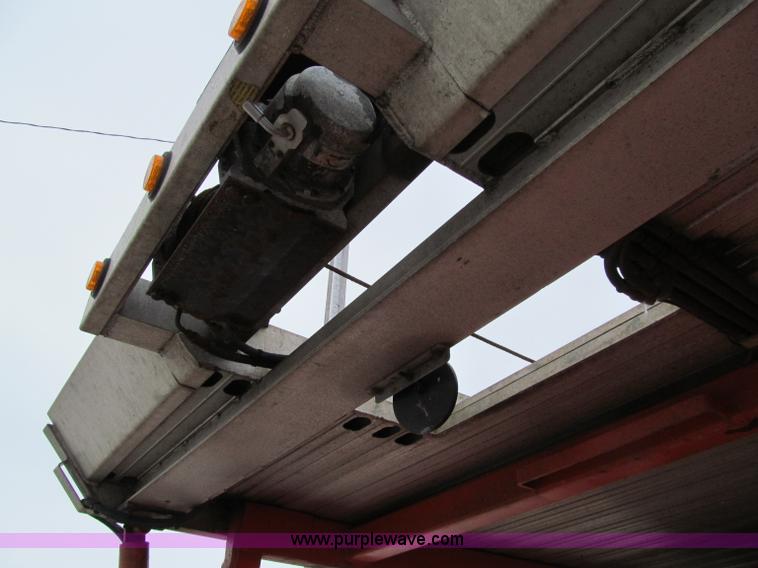 image for item D7070 2002 International 4900 roll off truck