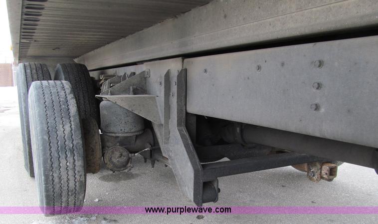 image for item D7070 2002 International 4900 roll off truck