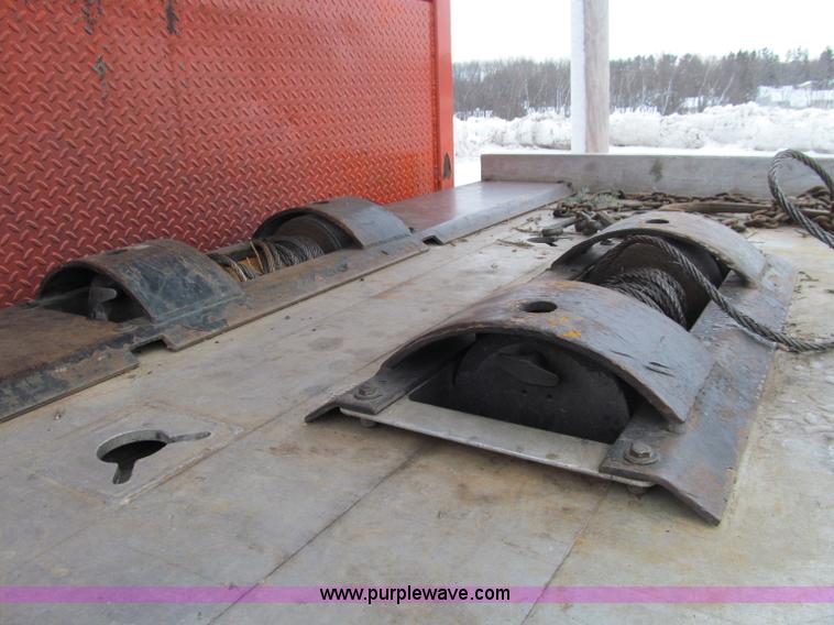 image for item D7070 2002 International 4900 roll off truck