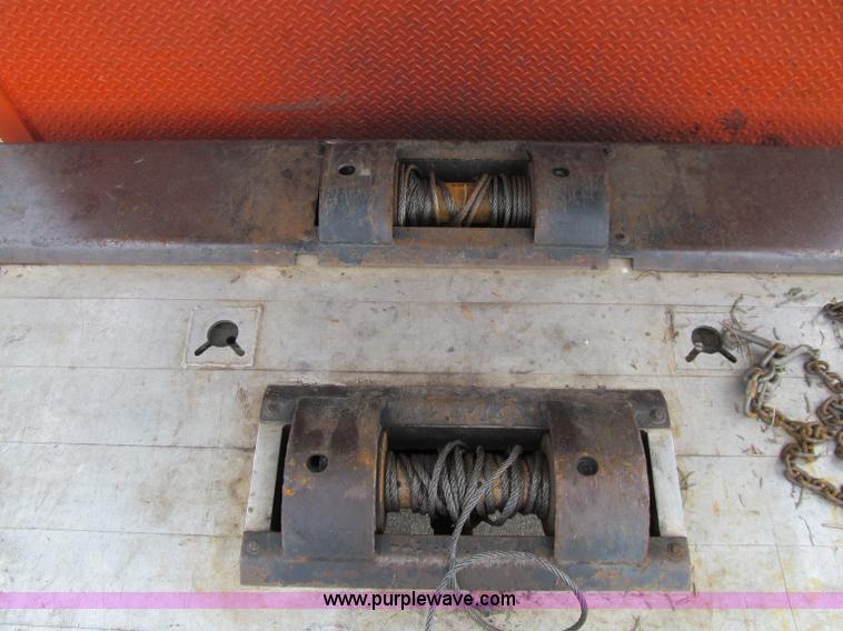 image for item D7070 2002 International 4900 roll off truck