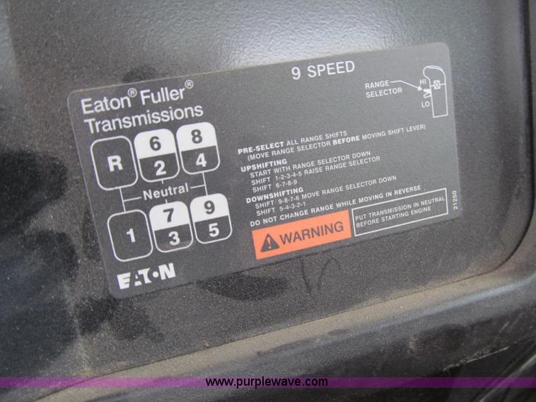 image for item D7070 2002 International 4900 roll off truck