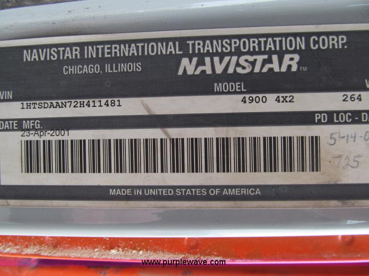 image for item D7070 2002 International 4900 roll off truck