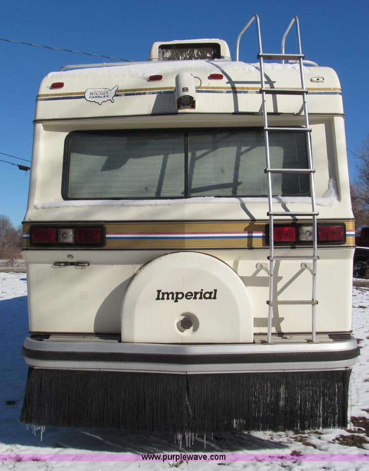 image for item E5870 1986 Chevrolet Imperial Holiday Rambler 33' RV
