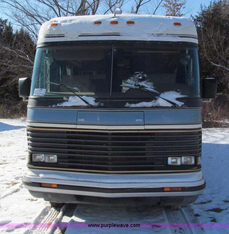 image for item E5870 1986 Chevrolet Imperial Holiday Rambler 33' RV