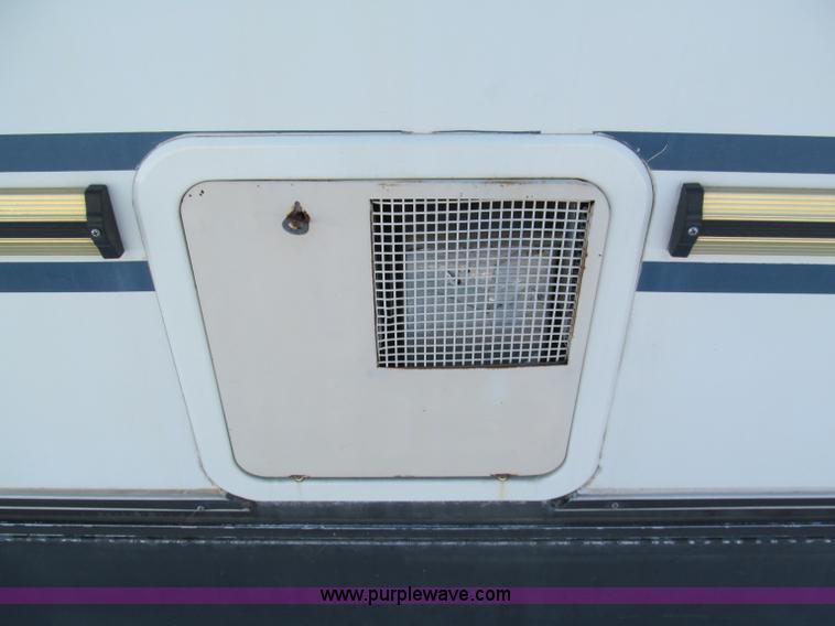 image for item E5870 1986 Chevrolet Imperial Holiday Rambler 33' RV