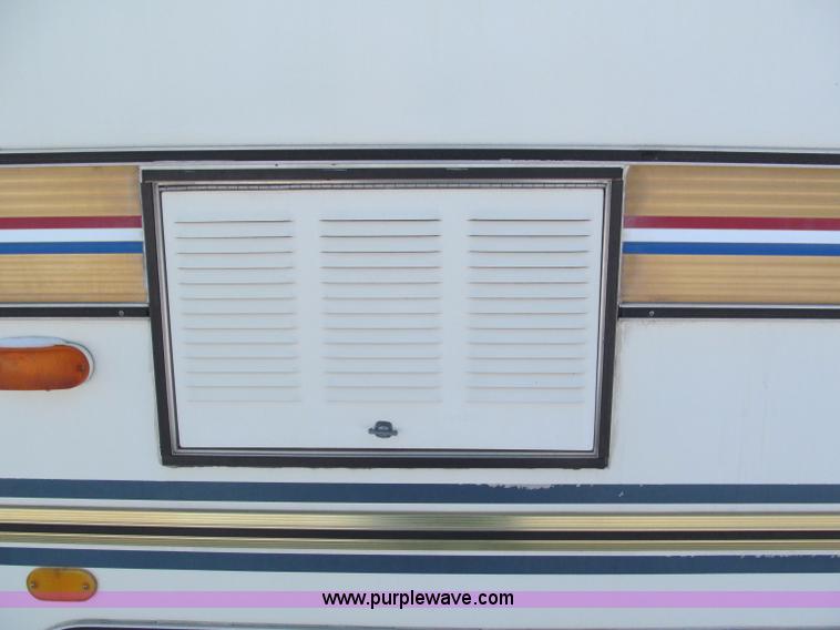 image for item E5870 1986 Chevrolet Imperial Holiday Rambler 33' RV