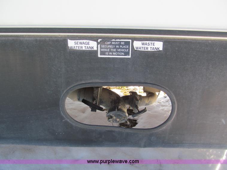 image for item E5870 1986 Chevrolet Imperial Holiday Rambler 33' RV