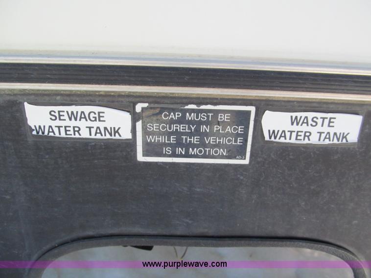 image for item E5870 1986 Chevrolet Imperial Holiday Rambler 33' RV