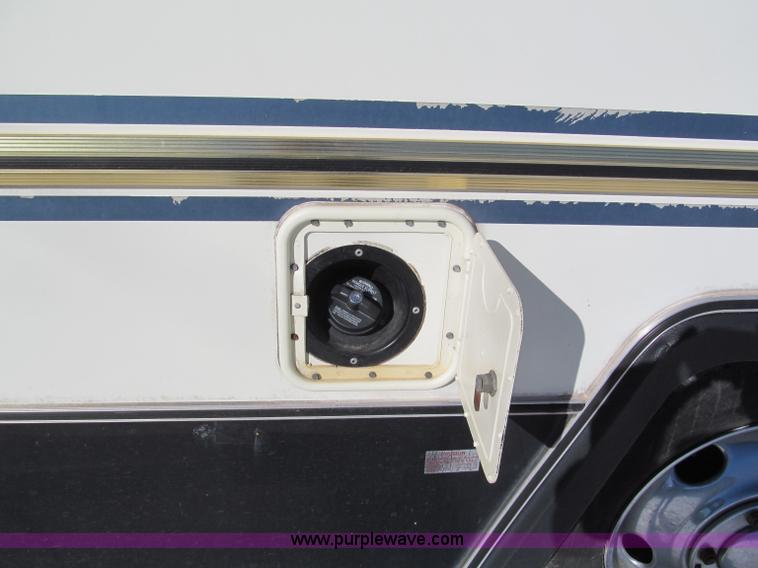 image for item E5870 1986 Chevrolet Imperial Holiday Rambler 33' RV