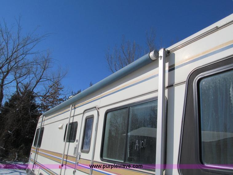 image for item E5870 1986 Chevrolet Imperial Holiday Rambler 33' RV