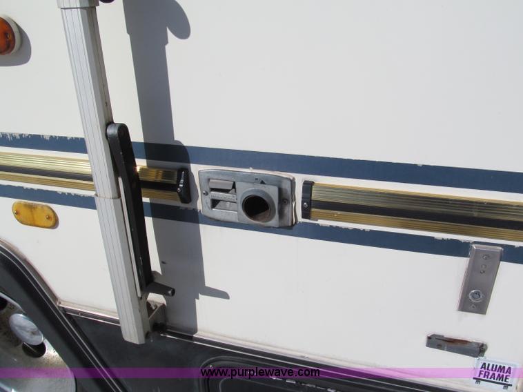 image for item E5870 1986 Chevrolet Imperial Holiday Rambler 33' RV