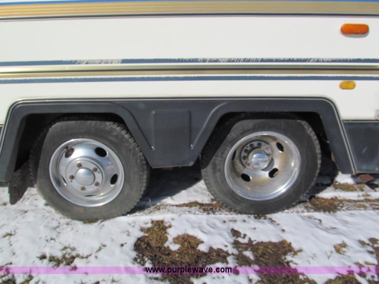image for item E5870 1986 Chevrolet Imperial Holiday Rambler 33' RV