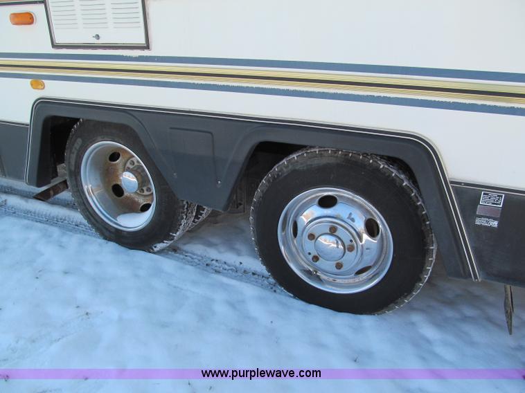 image for item E5870 1986 Chevrolet Imperial Holiday Rambler 33' RV