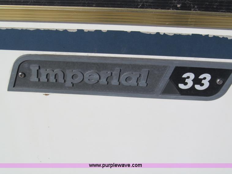 image for item E5870 1986 Chevrolet Imperial Holiday Rambler 33' RV