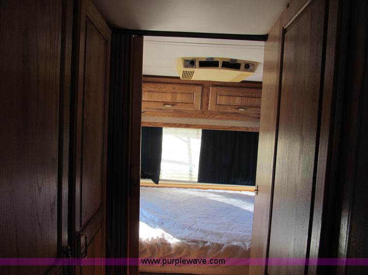 image for item E5870 1986 Chevrolet Imperial Holiday Rambler 33' RV