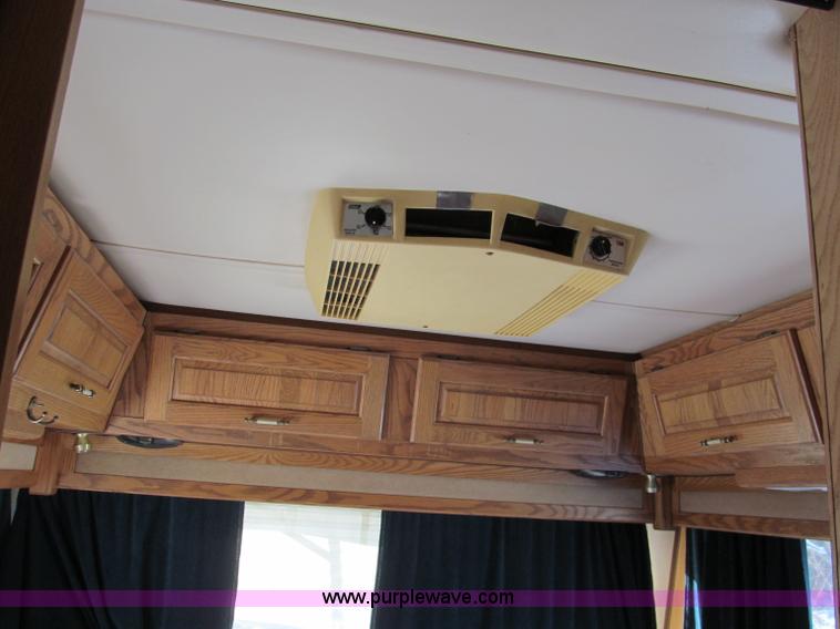 image for item E5870 1986 Chevrolet Imperial Holiday Rambler 33' RV